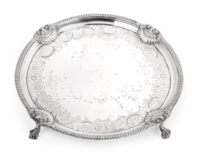 Lot 1212 - A George III Scottish Silver Salver, by P. Cunningham and Son, Edinburgh, 1810, circular and on...