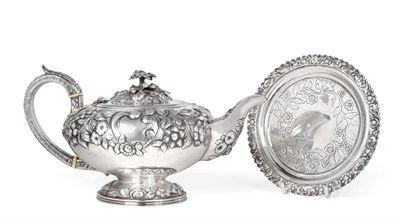 Lot 1217 - A George IV Silver Teapot, by Joseph Craddock, London, 1825, compressed circular and on...