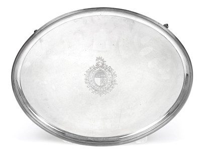 Lot 1223 - A George III Silver Salver, by John Scofield, London, 1788, plain oval and on four shell and scroll