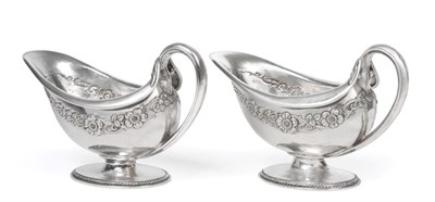 Lot 1249 - A Pair of George V Silver Sauceboats, by Omar Ramsden, London, 1922, each oval and on spreading...