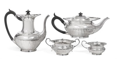 Lot 1251 - A Four-Piece Victorian and Edward VII Silver Tea and Coffee-Service, The Teapot by William...