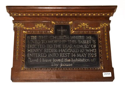 Lot 2058 - Haggard (H. Rider)  An oak framed memorial plaque inscribed 'In the Church where he loved to...