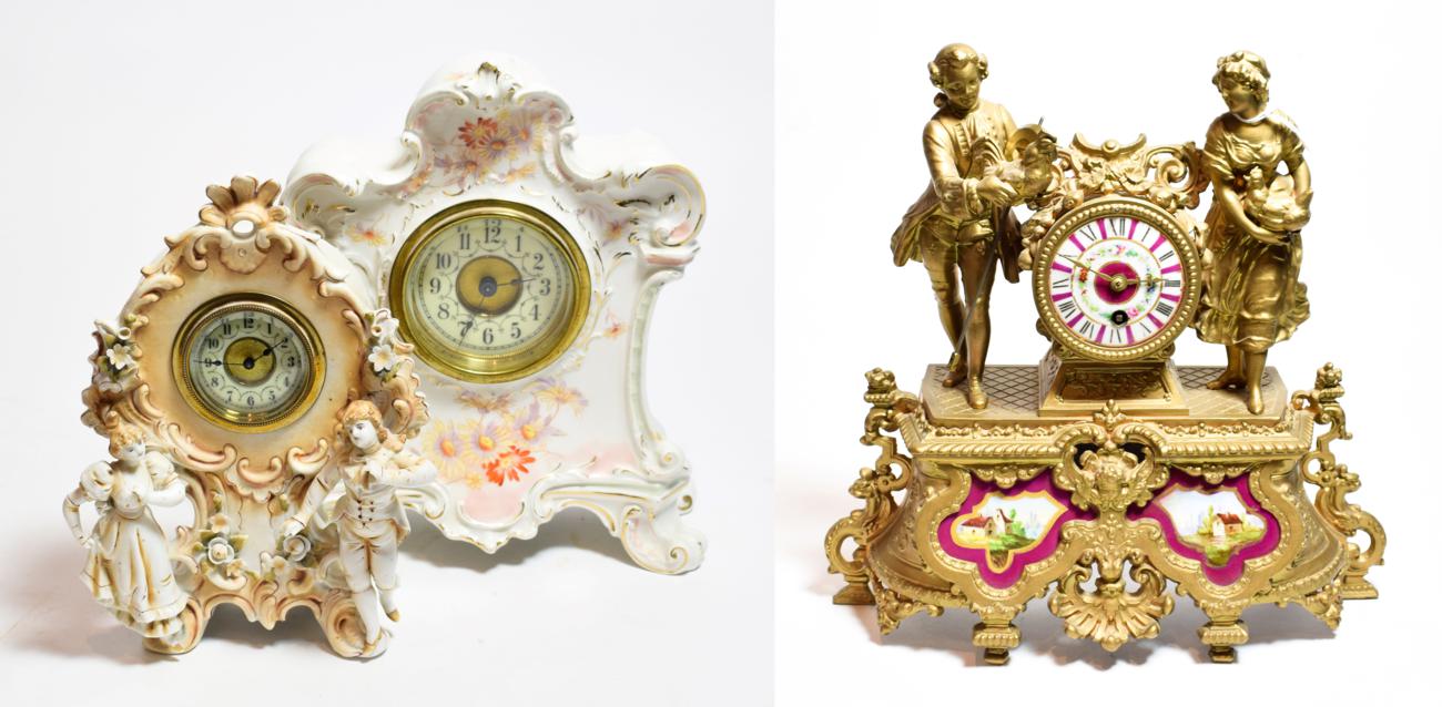 Lot 12 - A gilt metal and porcelain mounted mantel timepiece; and two Continental ceramic mantel...