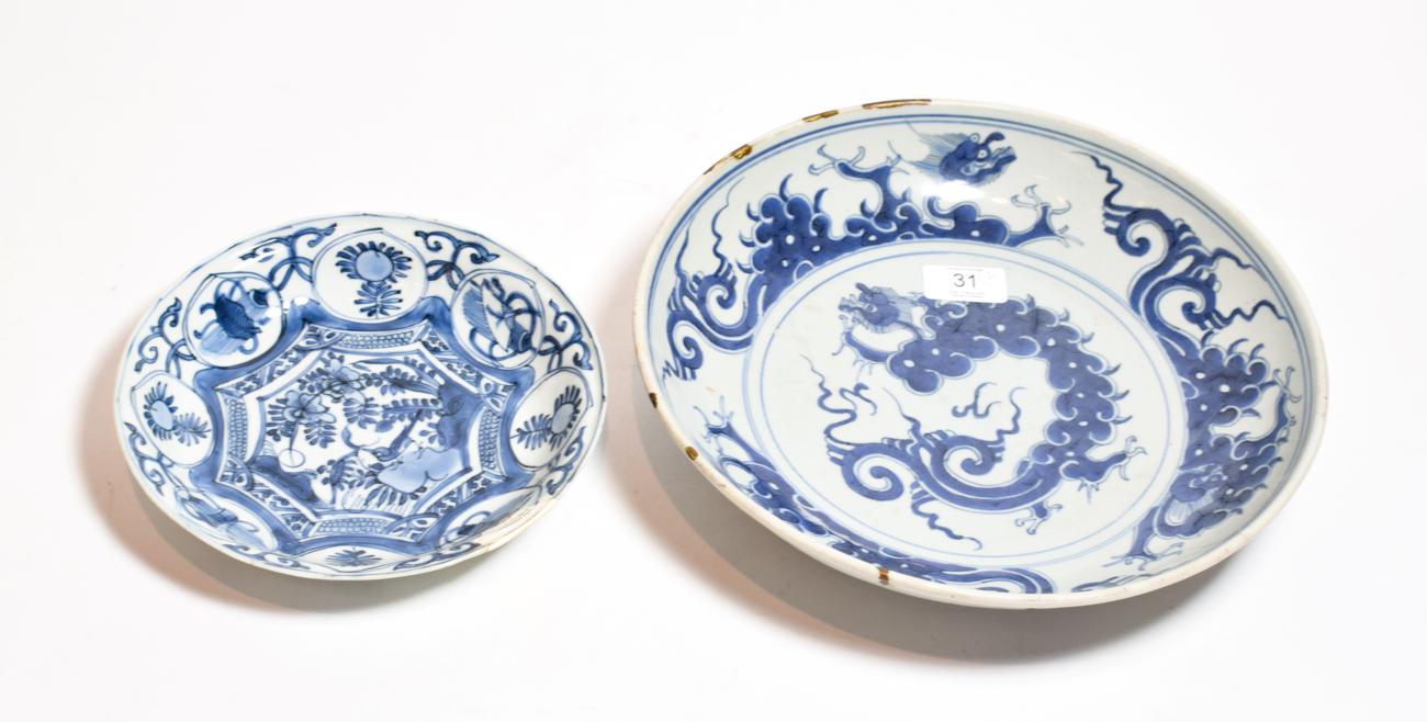 Lot 31 - An 18th century Chinese dish, blue and white dragon & flaming pearl design, 29.5cm diameter, (a.f.)