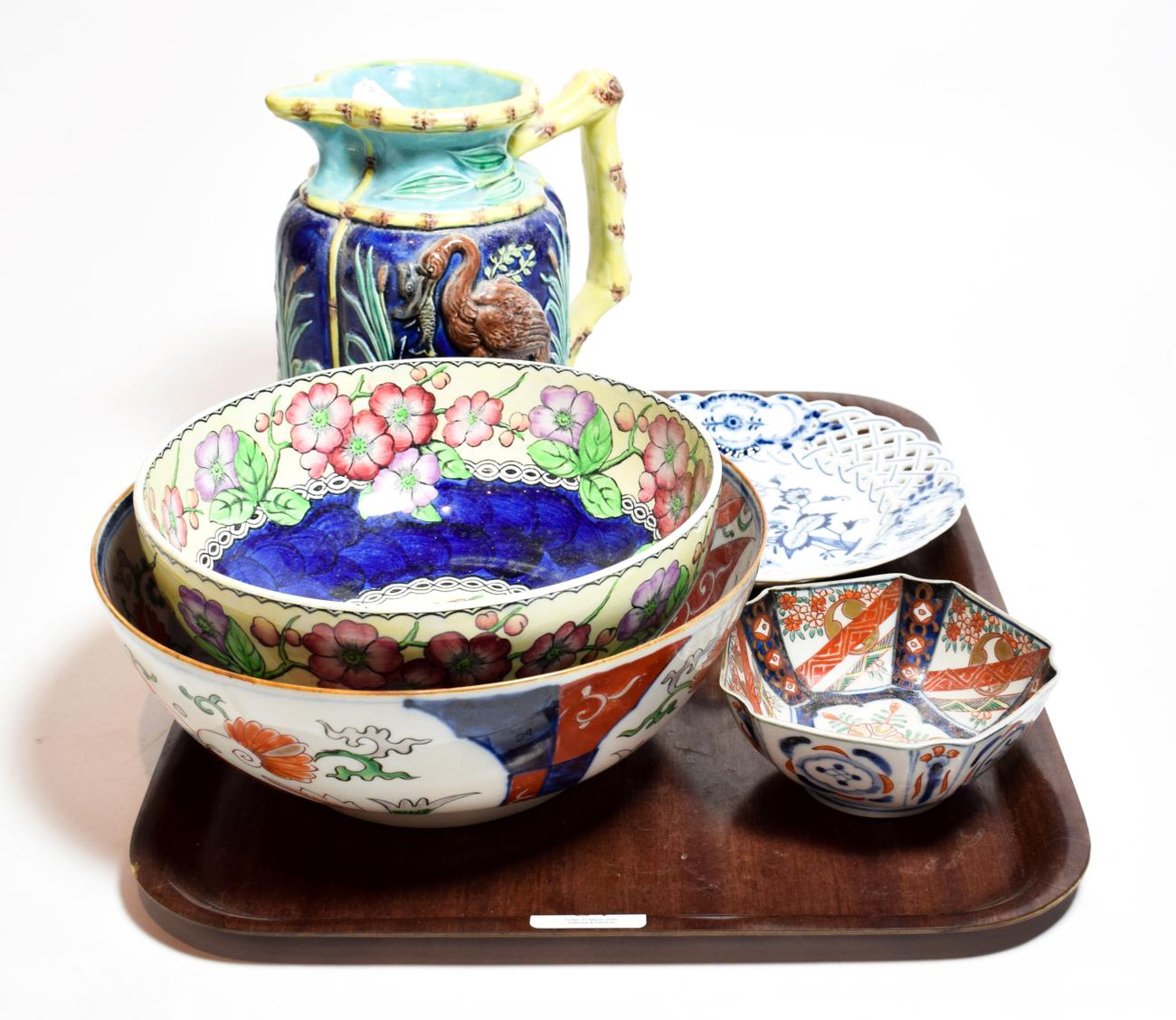 Lot 34 - A quantity of decorative ceramics including a 20th century blue and white pierced Meissen plate...