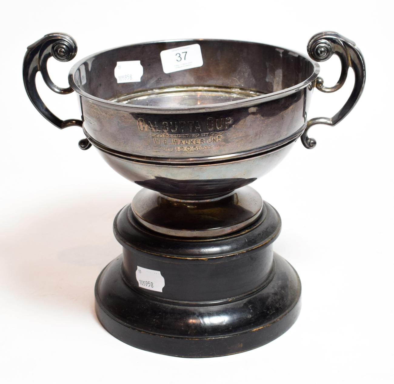 Lot 37 - A twin handled Silver trophy cup, Walker & Hall, Sheffield, 1904, engraved Cleveland Golf Club,...