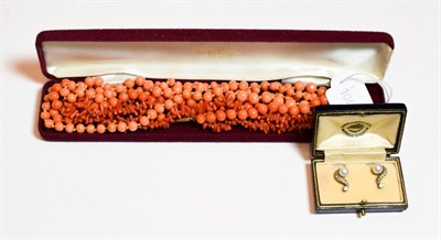 Lot 54 - Three coral bead necklaces and a pair of paste set earrings