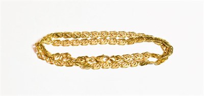 Lot 63 - A fancy link necklace, stamped '375', length 45cm
