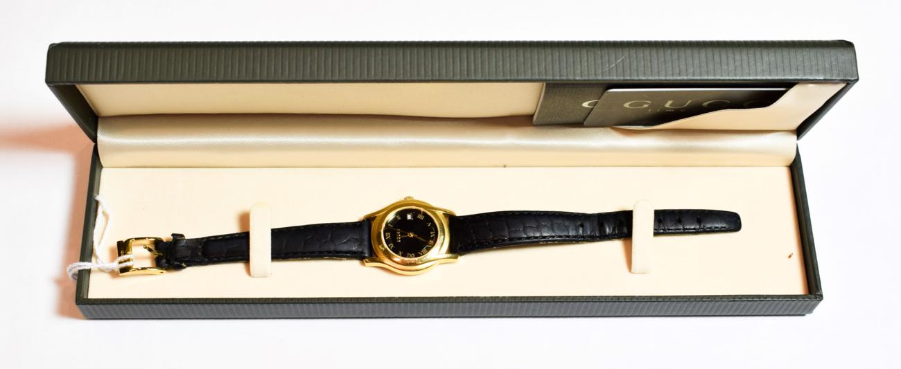Lot 75 - A Gucci ladies wristwatch (boxed with paperwork)