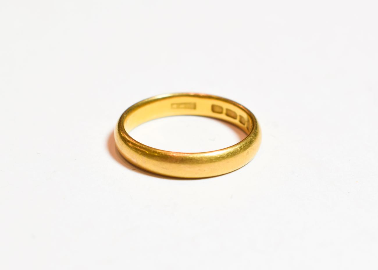 Lot 79 - A 22 carat gold band ring, finger size P1/2