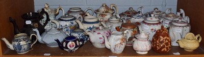 Lot 99 - A large quantity of 18th to 20th century teapots, including British and Chinese examples a.f. (qty)
