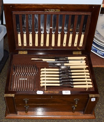 Lot 127 - An early 20th century oak canteen of silver plated cutlery, twelve settings