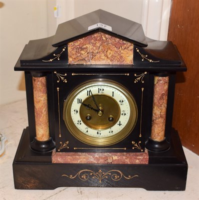 Lot 137 - A Victorian black slate and marble striking mantel clock, circa 1870