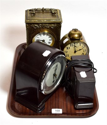 Lot 168 - A Smith electric mantel timepiece; a Smiths Enfield bakelite mantel timepiece; a carved oak...