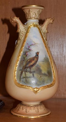 Lot 186 - Royal Worcester blush ivory pedestal vase, the main panel decorated with a pheasant, signed Jas...