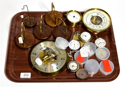 Lot 202 - An open faced pocket watch, case stamped 935, two nickel cased pocket watches, pocket damp/detector