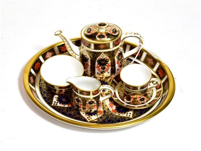 Lot 209 - A miniature Royal Crown Derby Imari pattern tea set, number 1128