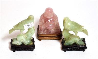 Lot 215 - A pair of Chinese green hard stone models of birds, together with a Chinese pink quartz model...