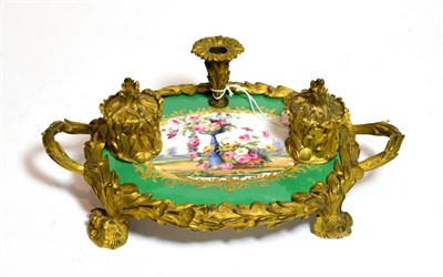 Lot 218 - A French Napoleon III porcelain and ormolu desk stand, painted floral vignette within gilt...