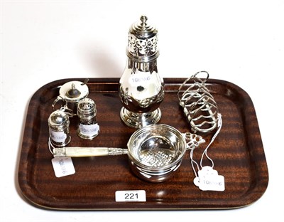 Lot 221 - A collection of silver and silver plate, including: two differing silver pepperettes, each with...