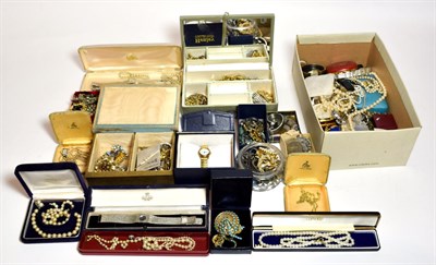 Lot 222 - A quantity of costume jewellery including wristwatches, brooches, plated chains, rings,...