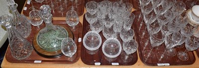 Lot 226 - Various 20th century cut glass including wines, brandy balloons, and three similar decanters (three