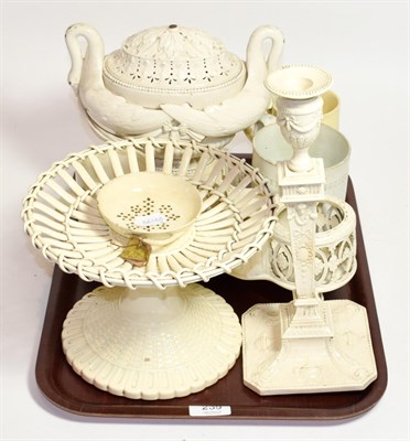 Lot 239 - Assorted cream wares, 19th/20th century, including Leeds reticulated lidded tureen, with twin...