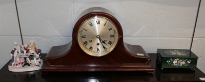 Lot 265 - An early 20th century mahogany triple train mantel clock; together with a German porcelain...