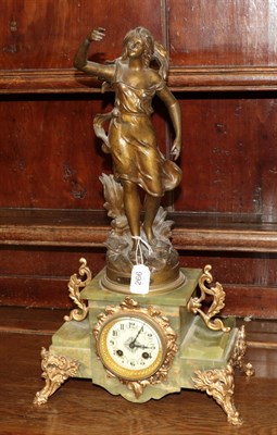 Lot 266 - A green onyx and spelter figural striking mantel clock