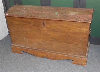 Lot 1084 - A 19th century pine dome top chest, with carrying handles to the sides, 140cm wide