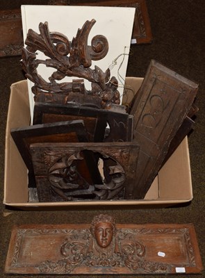 Lot 1104 - Various carved oak panels and furniture elements, 18th century and later including a heavily relief
