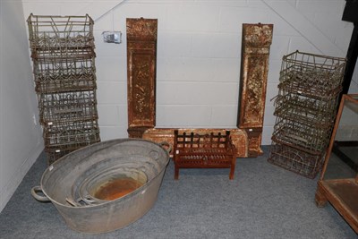 Lot 1145 - A graduated set of four twin handled galvanized pails, a group of wrought metal milk bottle crates