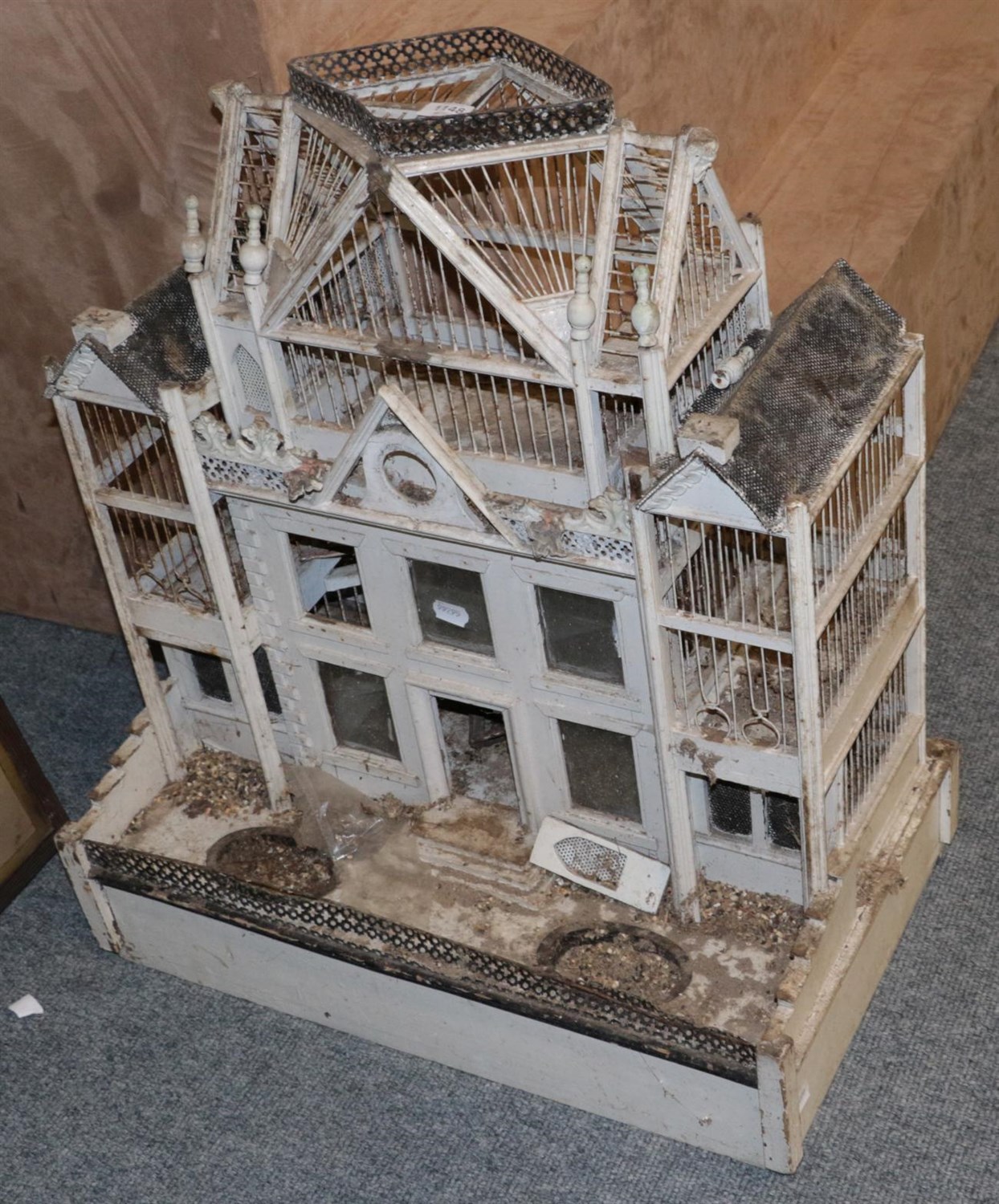 Lot 1148 - A Victorian architectural bird table, white painted, 80cm height (a.f.); together with a 19th...