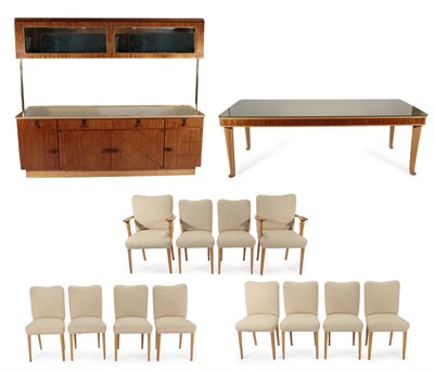 Lot 1162 - Attributed to Laszlo Hoenig: a mid 20th century fourteen piece dining suite, comprising a...