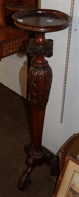 Lot 1163 - A 19th century carved walnut torchere, 108cm high
