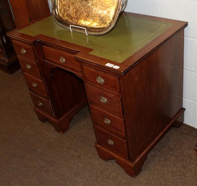 Lot 1166 - A George III mahogany kneehole desk, 98cm wide