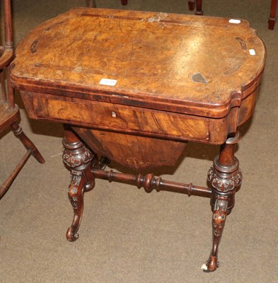Lot 1229 - A Victorian walnut games/sewing table