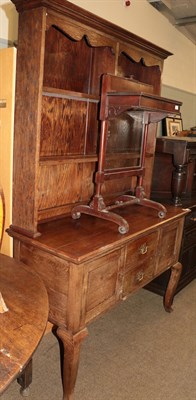 Lot 1244 - An oak dresser and rack