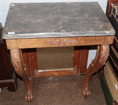 Lot 1258 - A marble topped console table
