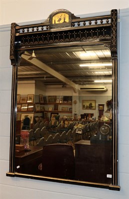 Lot 1273 - A 19th century parcel gilt ebonised mirror
