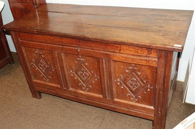 Lot 1274 - A late 17th century joined oak chest, the hinged lid enclosing a candle box, with three lozenge...