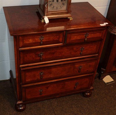 Lot 1278 - A Georgian style walnut and crossbanded chest of drawers