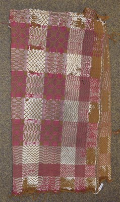 Lot 1285 - A 19th century Welsh wool blanket, worked in an olive green, pink and white checked design,...