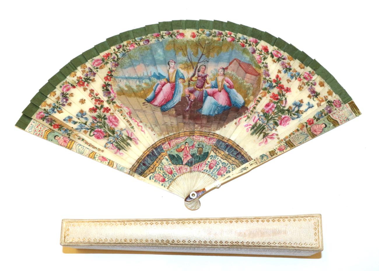 Lot 4010 - An 18th Century Ivory Brisé Fan, ribboned in green silk, the guards and gorge sticks painted...