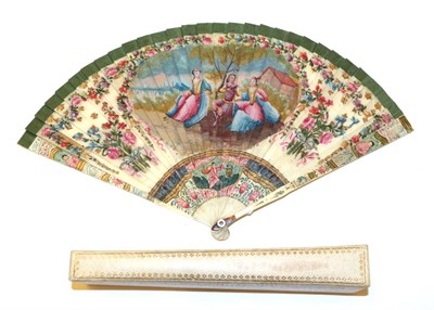 Lot 4010 - An 18th Century Ivory Brisé Fan, ribboned in green silk, the guards and gorge sticks painted...