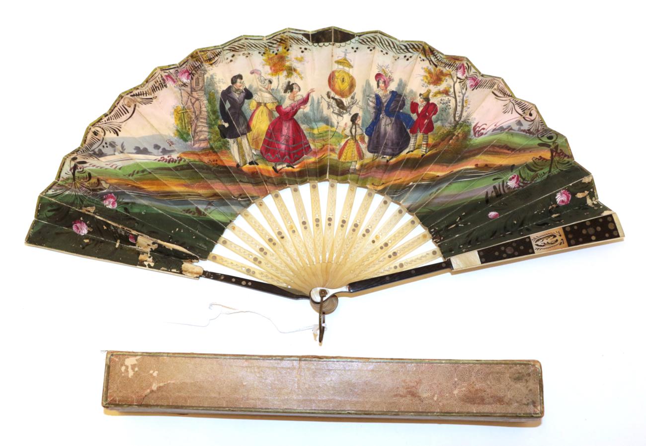 Lot 4022 - A Circa 1830's Wood and Horn Fan, the monture having wood guards dyed black, clouté with...