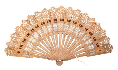 Lot 4034 - A Mid-19th Century Carved and Pierced Wood Brisé Fan, European, shaped to emulate a folding...