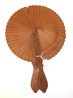 Lot 4036 - A Wood Cockade Fan with elaborately carved and shaped handles, these featuring scrolling...