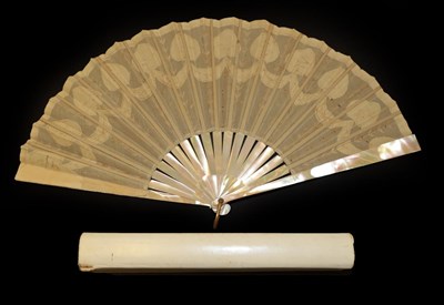 Lot 4046 - A Cream Gauze Fan, circa 1900, embroidered with gold and silver spangles, the monture of green/pink