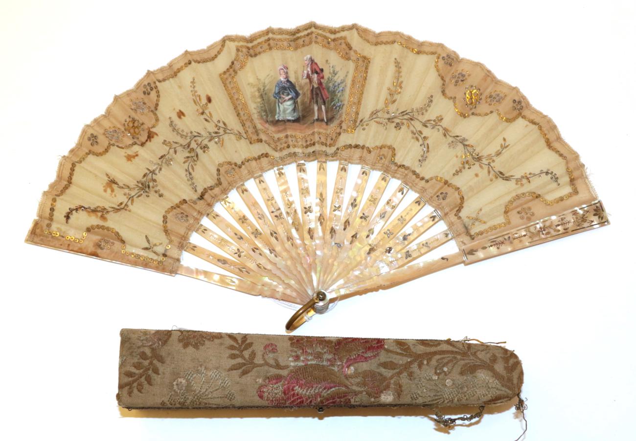 Lot 4054 - A Small and Dainty Early 20th Century Mother-of Pearl Fan, shaded pink, the monture lightly...